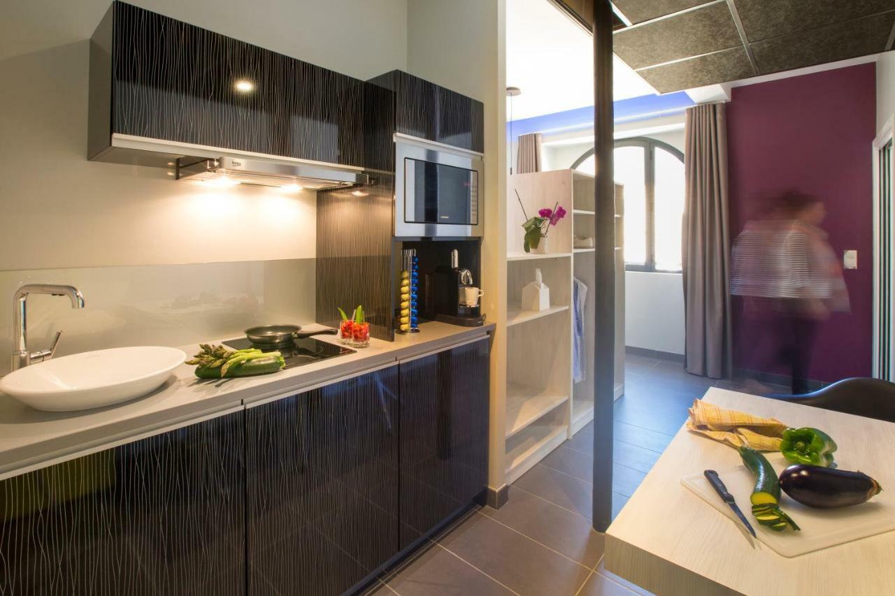 Appart'Hotel Les Fleurines By Urban Style Villefranche-de-Rouergue Exterior photo